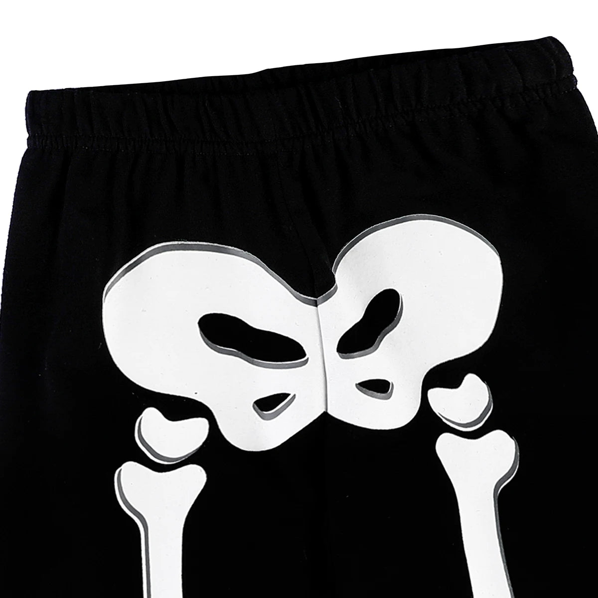 Black pants with elastic waistband and white skull graphic