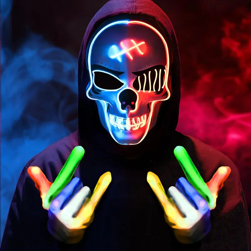 Hoodie-wearer with multicolor light-up skeleton skull face mask and glowing hands