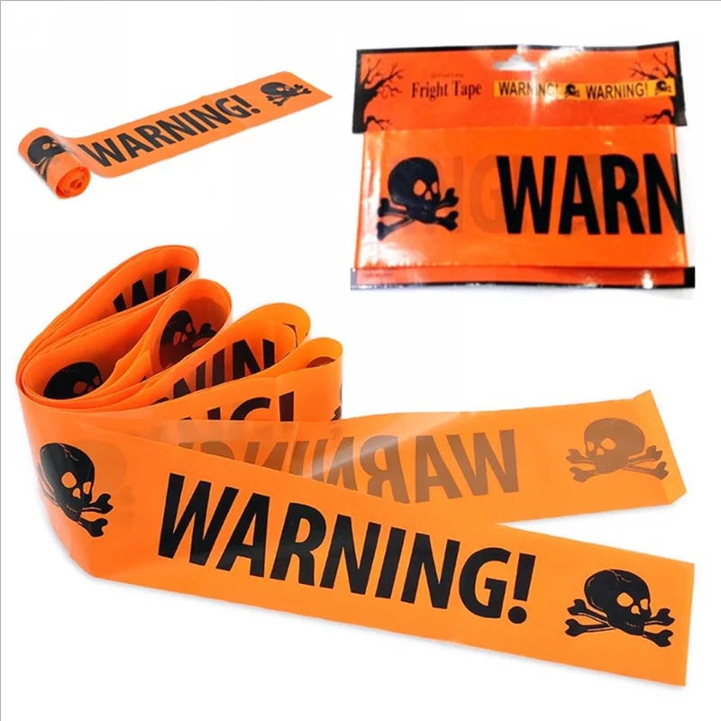 Halloween warning tape, orange with skull icons and "WARNING" text on rolled strips