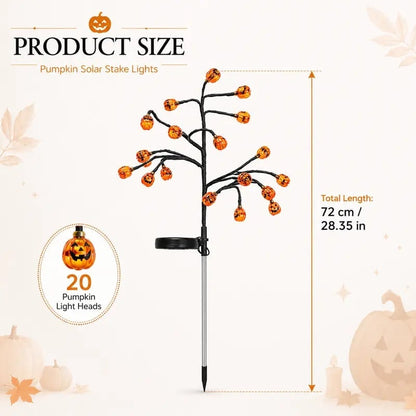 Pumpkin solar stake tree lights with glowing jack-o’-lantern heads on black branch stand