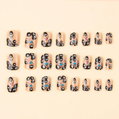 Set of square short press-on nails with black cartoon critters and colorful stars