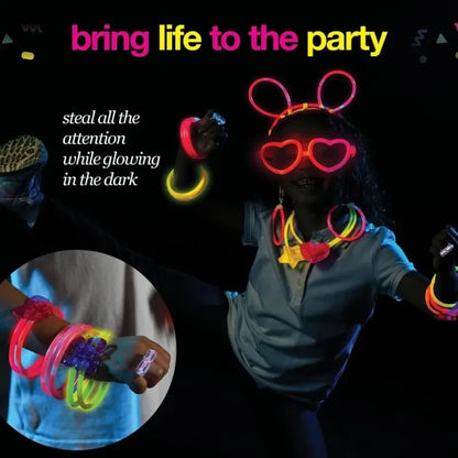 Glow stick party set worn: glowing headband, heart glasses, and multi-color light rings