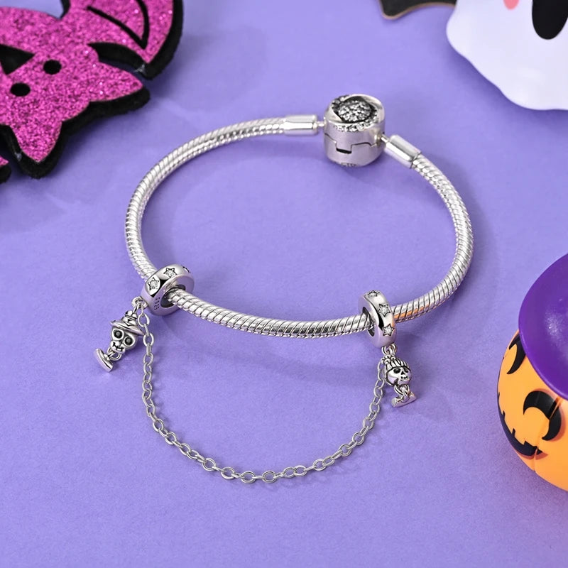 925 sterling silver Halloween charm bracelet with dangling cat and jack-o'-lantern charms