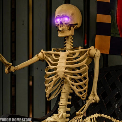 LED skeleton figure prop with purple glowing eye lights