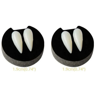 Vampire fang dentures with two off-white pointed teeth on black gum bases (larger set)