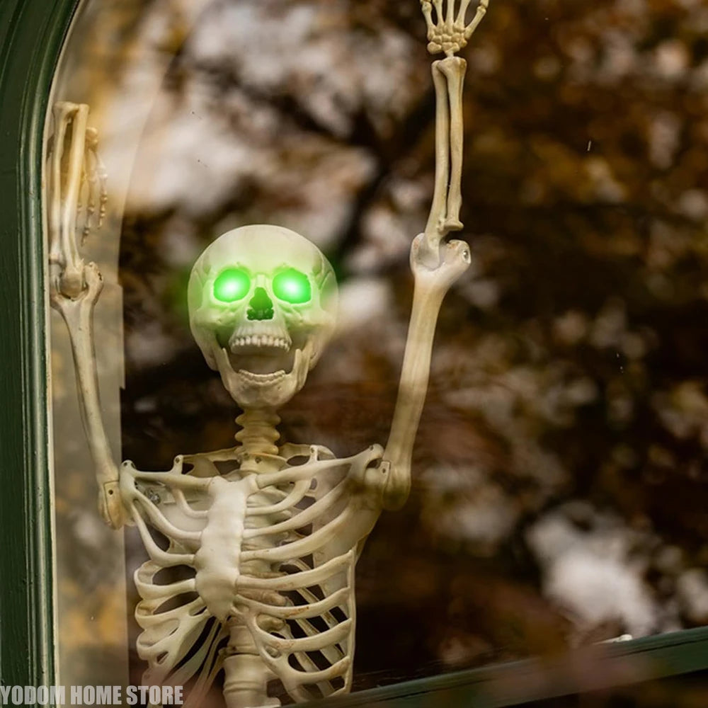 LED skeleton figure prop with green glowing eye lights