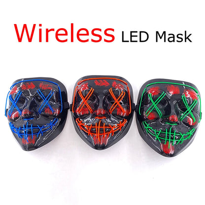 Three LED purge masks on display, black fabric with blue, red, and green neon face lights
