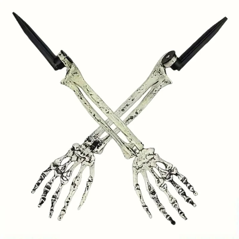 X-cross skeleton hand stakes with long metal prongs and bony finger details