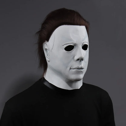 Michael Myers-style Halloween mask with white face and black eye cutouts