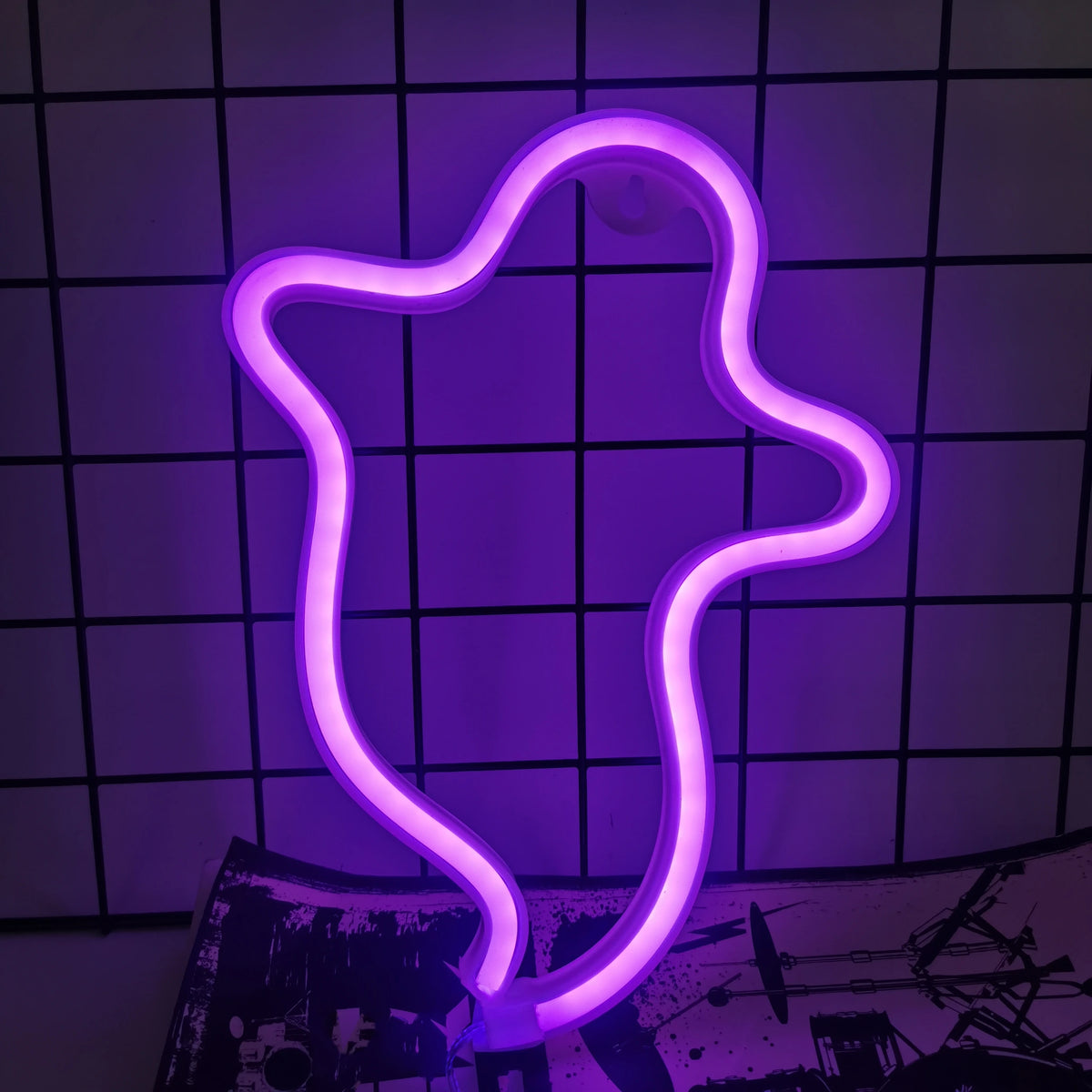 Purple LED neon wall decor with scalloped star-shaped outline