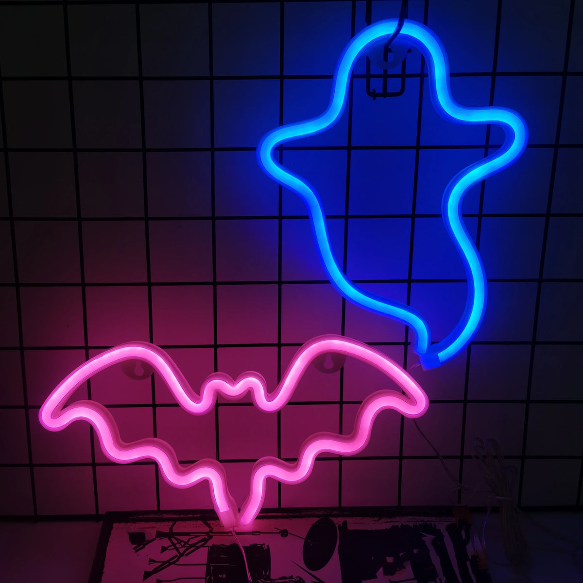 LED neon wall decor with blue alien outline and pink bat silhouette