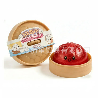 Red dome-shaped squishy fidget toy with cute face, in round beige container.