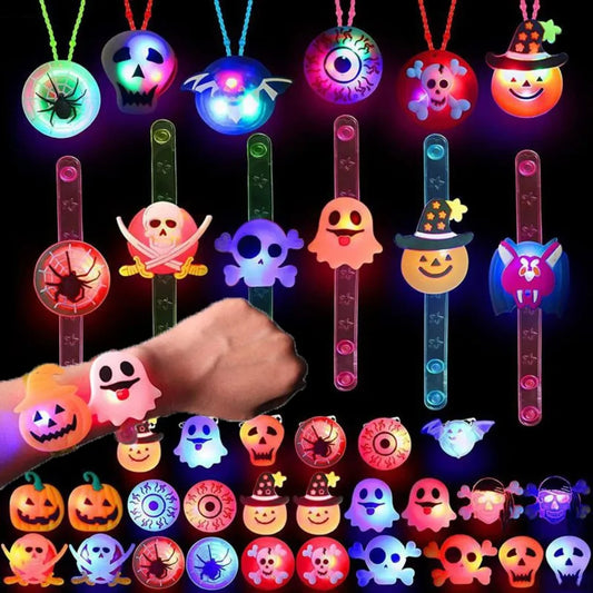 Glow-in-the-dark Halloween bracelets and rings with colorful skull, pumpkin, and ghost faces