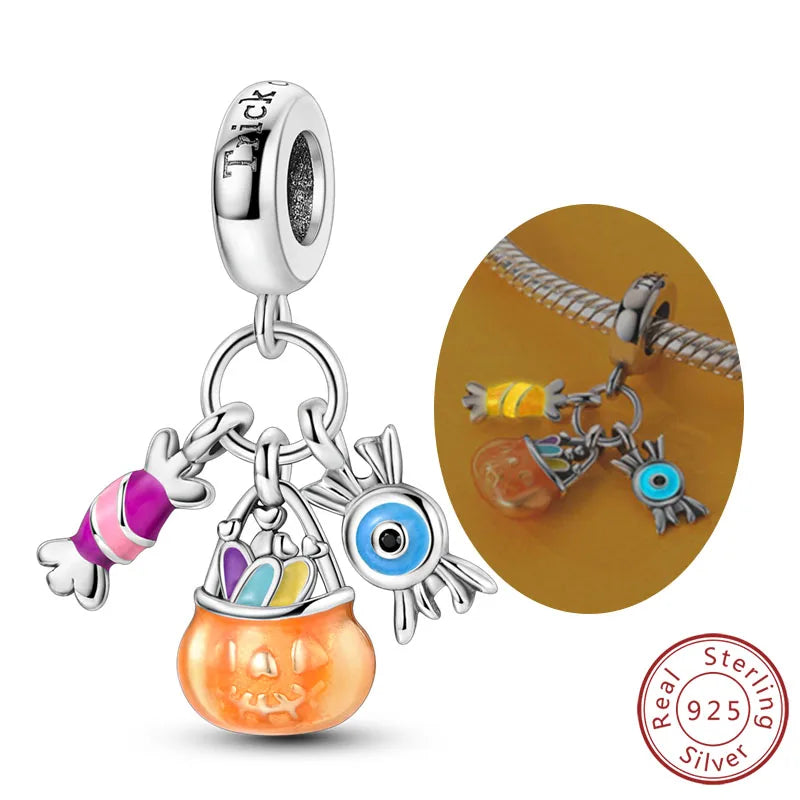 925 sterling silver Halloween charm bead with orange cauldron and blue eye detail