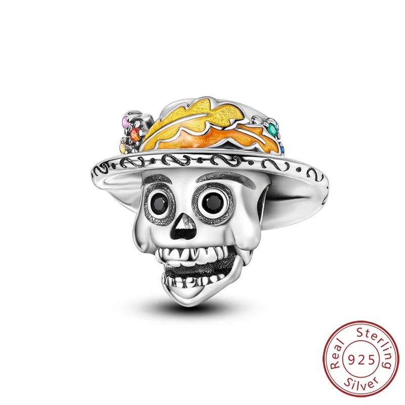925 sterling silver Halloween charm bead of skull wearing a gold-outlined witch hat