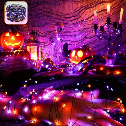 Purple and orange LED fairy string lights draped across Halloween porch decor