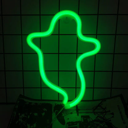 Green LED neon wall decor featuring hooded spirit silhouette with pointed top