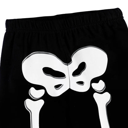 Black pants with elastic waistband and white skull graphic
