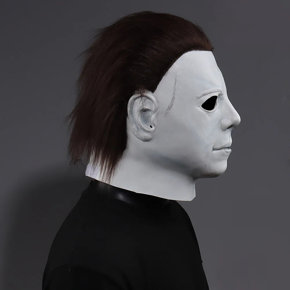 Michael Myers-style Halloween mask with white face and side profile dark hair