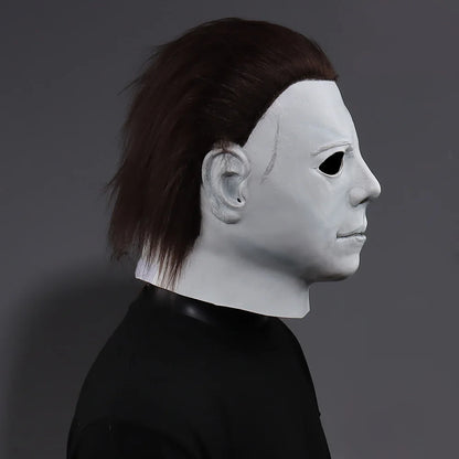 Michael Myers-style Halloween mask with white face and side profile dark hair