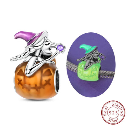 Halloween charm bead in 925 sterling silver with a glowing witch on a pumpkin