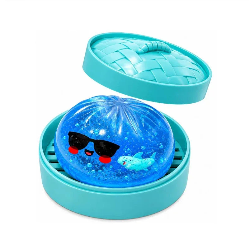 Blue glitter squishy stress ball in teal open case, cute face and glossy texture