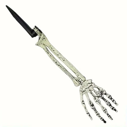 Single skeleton hand garden stake with long metal prong and bony fingers