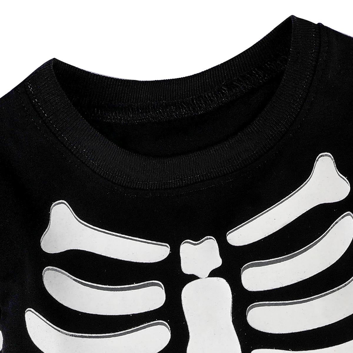 Black long-sleeve shirt close-up with white ribcage skeleton graphic at neckline