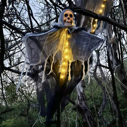 Glowing skeleton gauze hanging ghost decoration with lit skull head