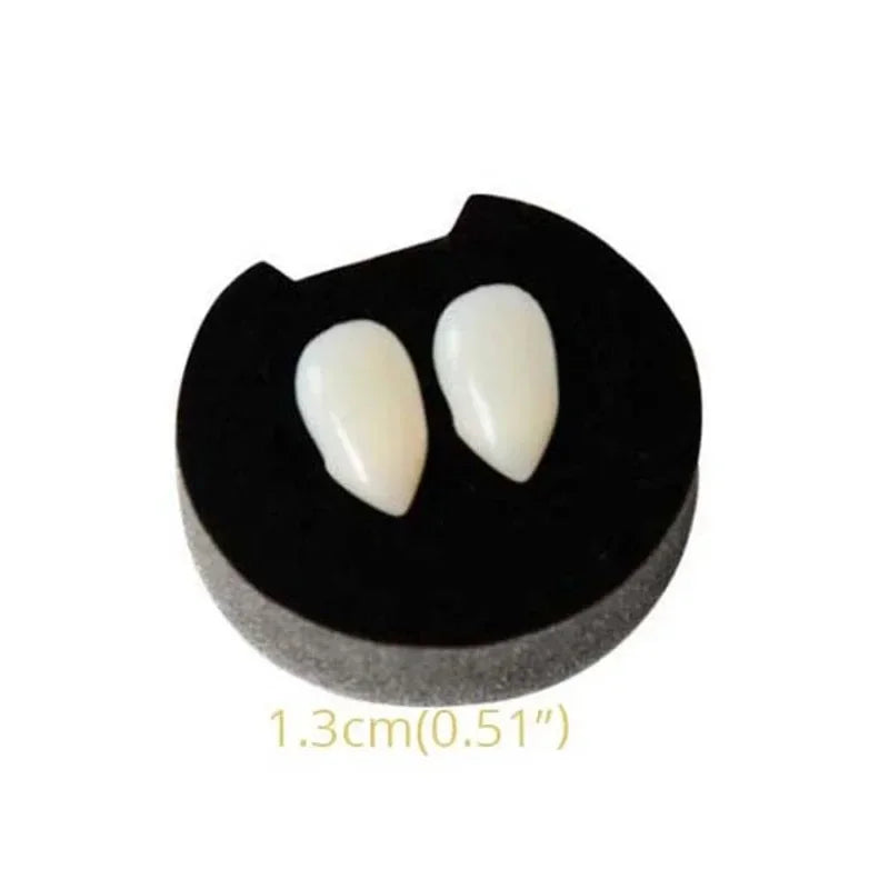 Vampire fang dentures with two off-white pointed teeth on a black gum base (small)