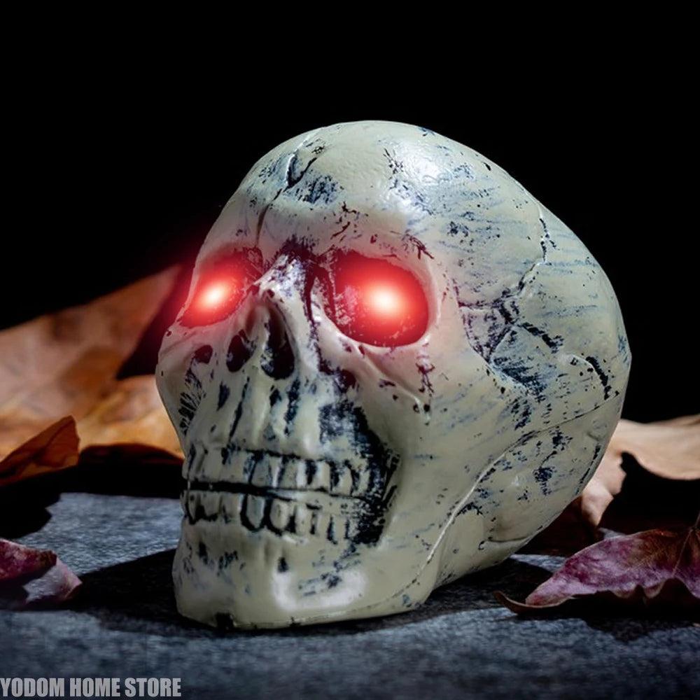 LED skull face prop with two red glowing eye lights