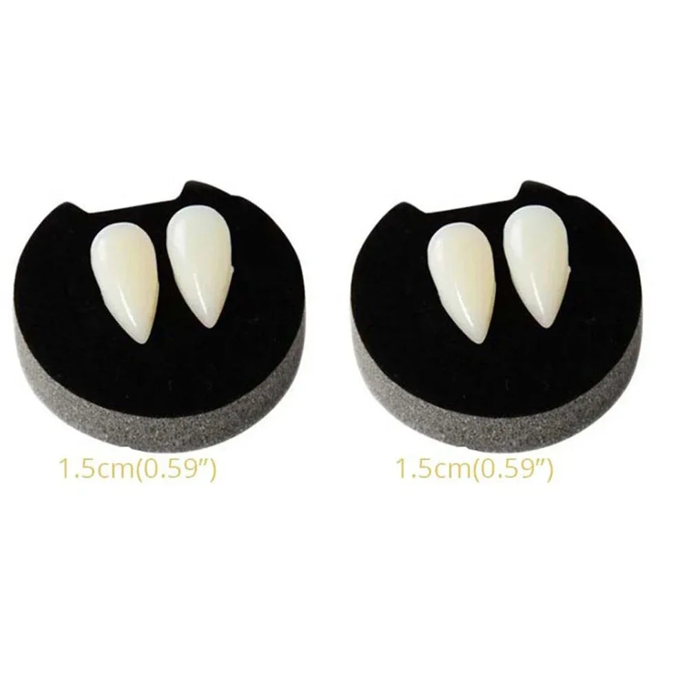 Vampire fang dentures with two off-white pointed teeth on black gum bases (pair)