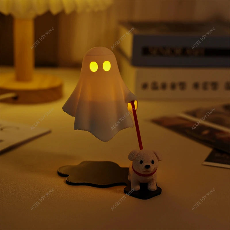 Warm glowing ghost puppy night light with yellow eyes and red LED stick