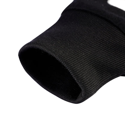 Black ribbed knit cuff at the end of a sleeve