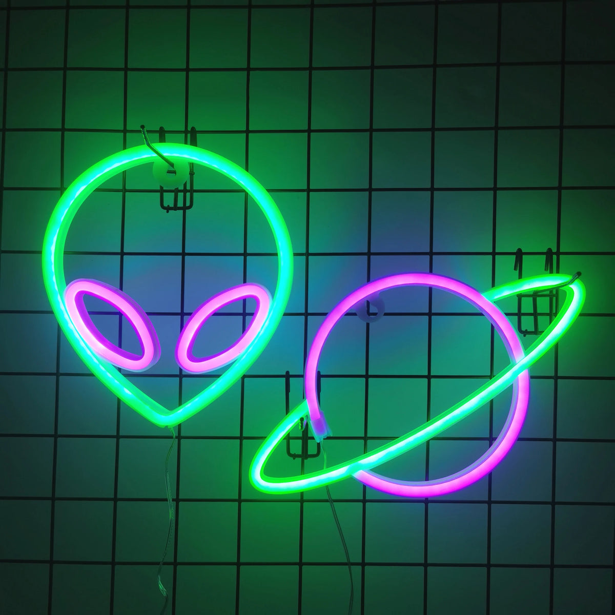 LED neon wall decor set with green and purple alien-head outlines