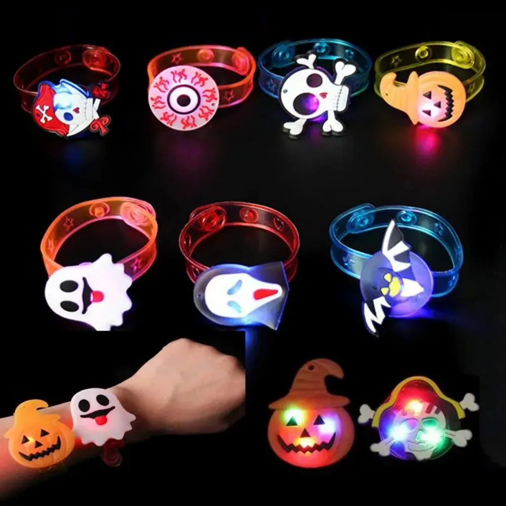 Set of glow-in-the-dark Halloween bracelets with skull and witch character faces