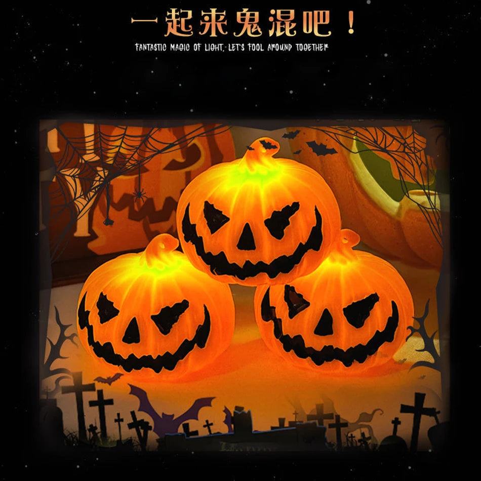 Set of glowing pumpkin jack-o’-lantern LED candle lights with carved faces
