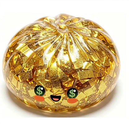 Gold glitter squishy stress ball with cartoon face and $ eye details